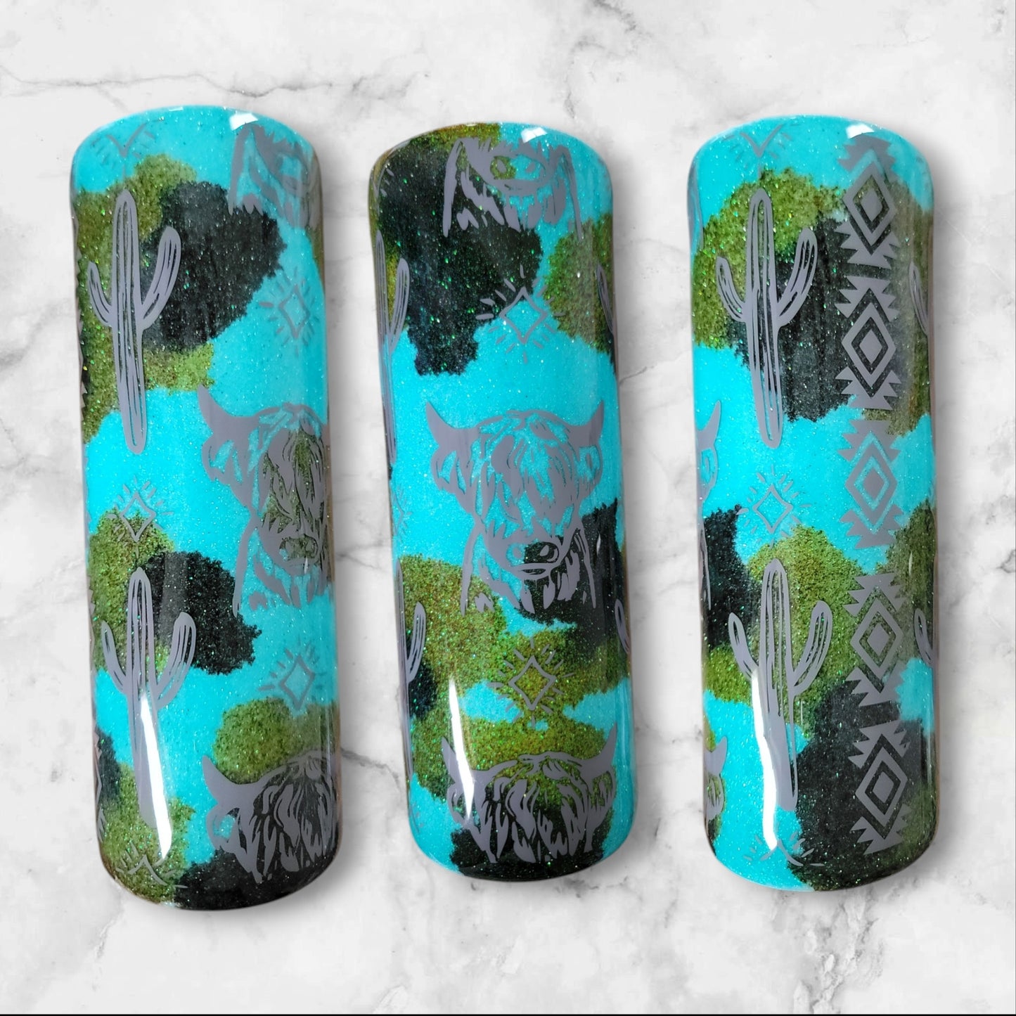 Teal cow print 20oz skinny tumbler